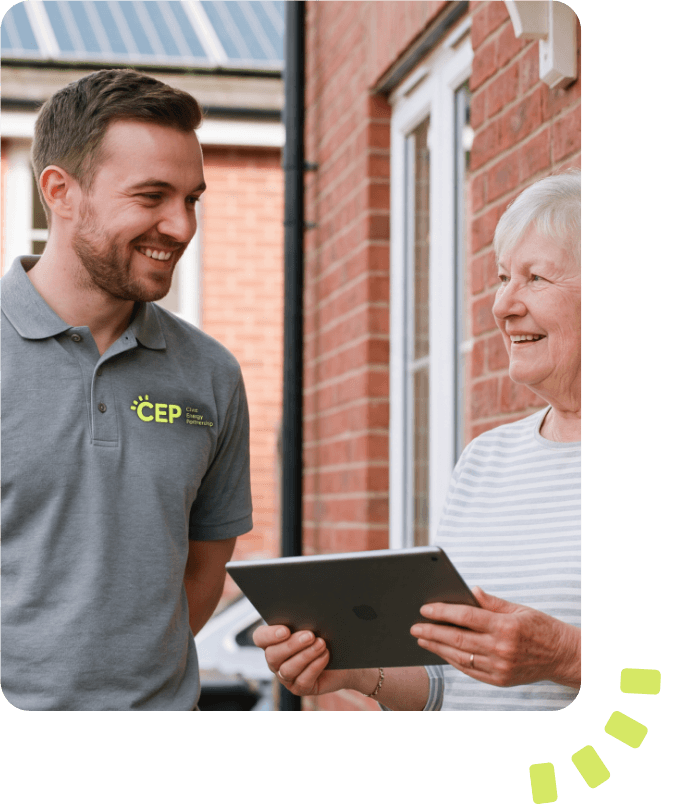 CEP employee talking with household resident on her doorstep